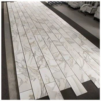Jubin Lantai Marmar Calacatta Gold